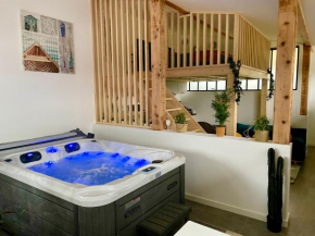 Loft avec jacuzzi et terrasse privés